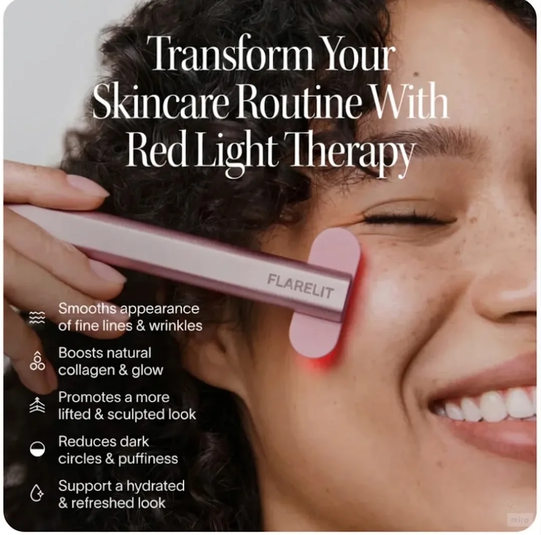 Model using the Flarelit 4-in-1 red light therapy wand along her jawline